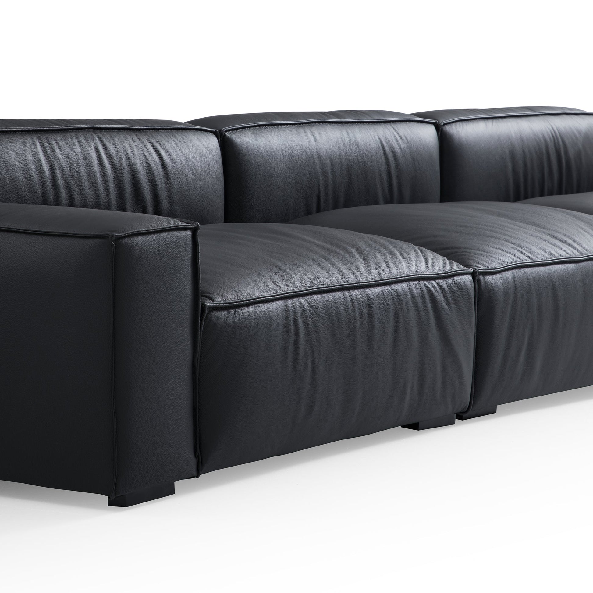Luxury Minimalist Black Leather Sectional and Ottoman-Black
